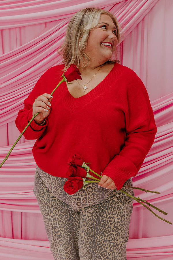 A cozy knit sweater top designed for a flattering and comfortable fit.