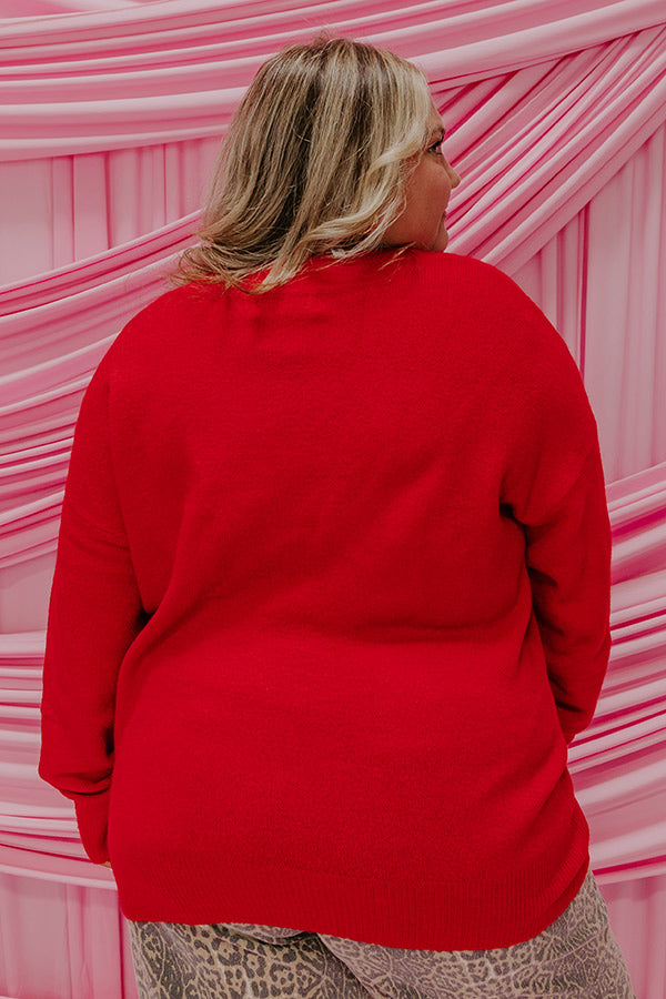 A cozy knit sweater top designed for a flattering and comfortable fit.